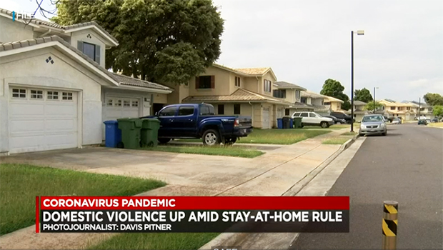 A neighborhood with cars in the driveways