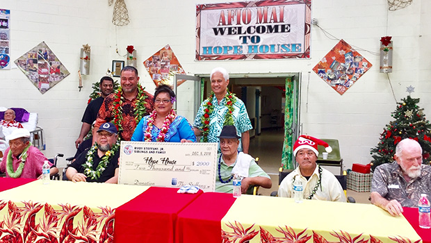 Utagamamao Taisi Steffany and his sister Sina Steffany-Sunia with Hope House residents and board members