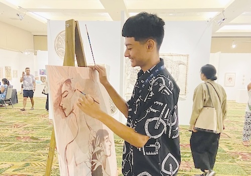 Talanoaifaivaoalii “Talanoa” J. Lagafuaina with painting