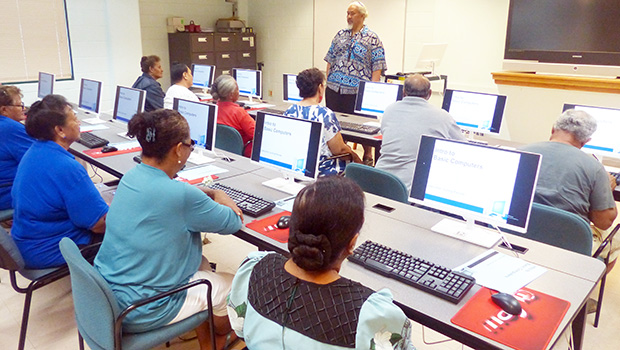 Computer instructor, Loring Fa'iivae (front-standing) of the Feleti Barstow Public Library on Tuesday during the start of the basic computer skills taught class for seniors