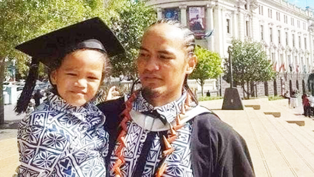 Jeremiah Malaki Tauili'ili with his son.