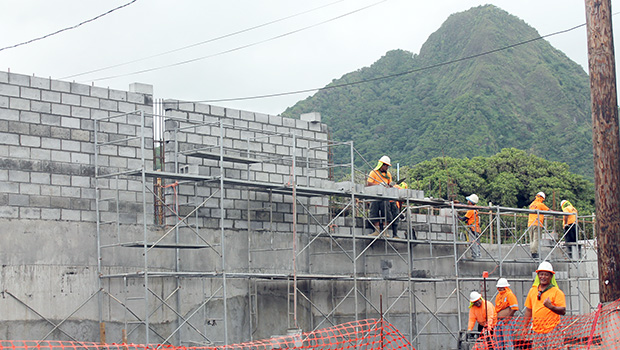 Nana's Construction crew building block wall at TCF