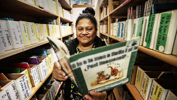 Soreta Felise showing her teaching resources she makes by hand