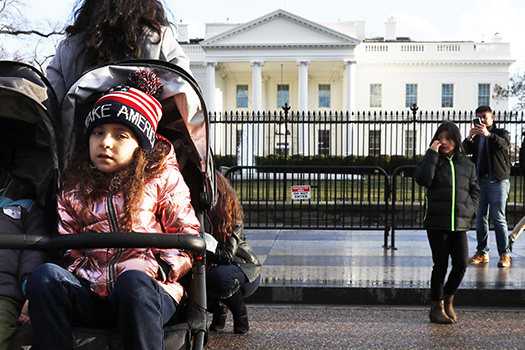 Tourists visit the White House, Friday March 22, 2019