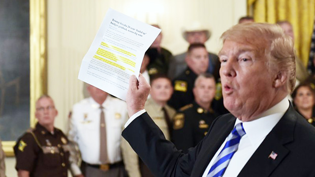 Donald Trump responds to a reporters