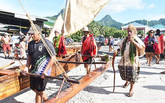 Vaka being carried down to the sea