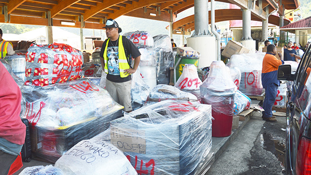 Man with large amount of cargo to load on MV Lady Naomi
