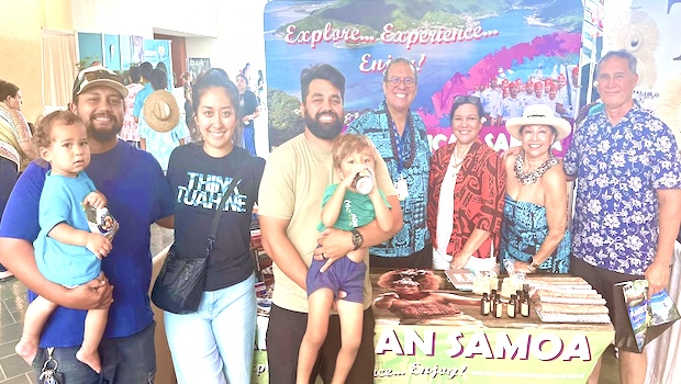 visitor's bureau staff greeting Samoans from around the world