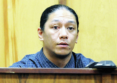 Lama Lauvao on the stand in court.