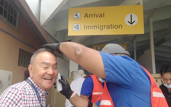 Ministry of Health staff screening all arriving passengers at Amata Kabua International Airport in Majuro.