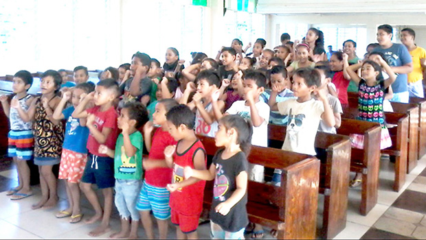  Vaimoso Methodist Church children learning their White Sunday verses.
