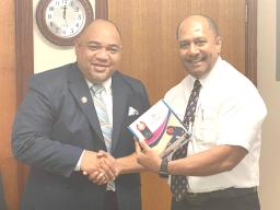 Faipule Tapai Ala’ilepule Benjamin Vaivao hands over devices