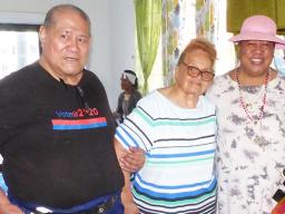 Rachael Mitchell of Fagatogo (center) 