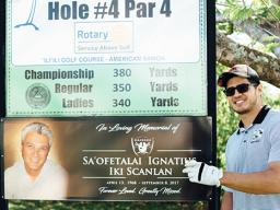 Toa Scanlan in front of his late father Iki's hole #4 sign