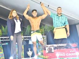 Local bodybuilder Frank Asi Tuisalega receives his trophy