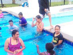 PHS's high school swimming class with instructor, Debbs Cox
