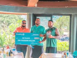 Matasaua fautasi from Manu'a receiving their first prize check