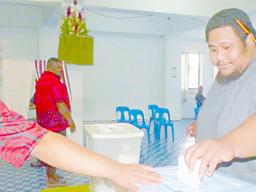 A voter casts his ballot in the mid-term election last year.