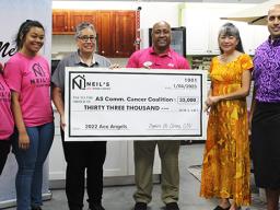 ACE presenting check to Cancer Coalition