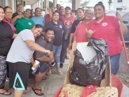Department of Human Resources (DHR) personnel working in Adopt A School program in 2019.
