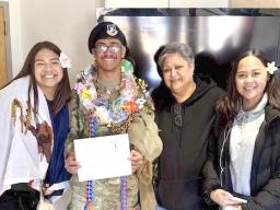 Airman First Class Vincent M.J. Laupola and family