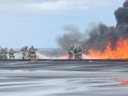  Airport firefighters fighting fire