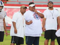 All-Star Head Football Coach, Kevin Magalei speaking with his offensive coordinator, Sua’ese Pooch Ta’ase