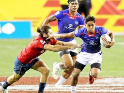 Samoa’s Elisapeta Alofipo makes a break against Spain