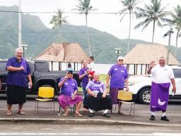 Lt. Governor Lemanu Peleti Palepoi Sialega Mauga (2nd from right) and Port Administration director Taimalelagi Dr. Claire Poumele (far right), along with officials and employees of various government departments and agencies.  Seated (right) is HC Afoa Moega Lutu, whose children and family members are among those spearheading efforts to bring awareness to Alzheimers. 