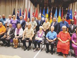 Uifa’atali Amata posing for a group portrait with Pacific leaders at the PICL