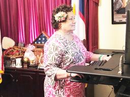 Congresswoman Uifa’atali Amata at desk
