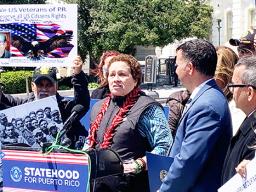 Amata speaking at Veterans event