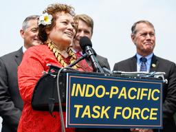 Amata speaking at press conference  