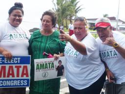 Incumbent Congresswoman Aumua Amata with supporters during her campaign wave at Avau