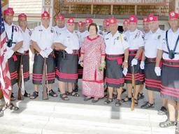 Congresswoman Aumua Amata  and Fitafita guard