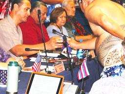 Western Pacific Regional Fishery Management Council, Taotasi Archie Soliai (left) accepting his ‘ava cup, In the background (L-R) are: Lt. Governor Lemanu Peleti Mauga, Council executive director Seuta’atia Kitty M. Simonds, and Secretary of Samoan Affairs, Mauga Tasi Asuega.