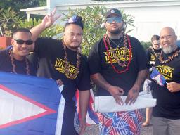 Tanu (Utulei), Charles (Manu’a/Ili’ili), Tau (Manu’a/Atu’u), and Duffy (Manu’a/Petesa) with the American Samoa flag 