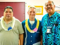 ASCC-ACNR Director Aufa’i Apulu Ropeti Areta (right) gives his well-wishes to two retiring staff members, Network Specialist Albert Siliga (left) and Health Communications Researcher Micah van der Ryn