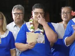 ASCC staff performing at caroling event