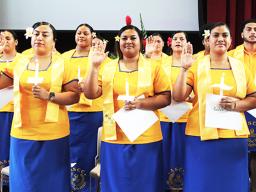 ASCC STUDENTS being inducted into the Phi Theta Kappa Honor Society prepare
