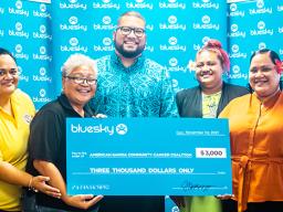 Justin Tuiasosopo (center) with Bluesky staff