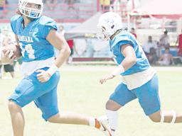 Dean Briski taking a fumble recovery