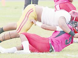 Faga’itua Vikings Ina Ta’ase is stopped immediately in the back by big Francis Mauigoa