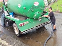 Crew from the American Samoa Power Authority with their vaccumn truck