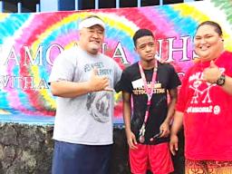 Samoana HS principal Rod Atafua with Special Education teacher Mafutaga Taase and SPED student DeAndre Chen