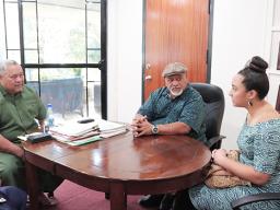 Brandy Atuatasi with GOVERNOR AND STAFF MEMBER