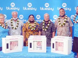 Bluesky staff presenting automated external defibrillators 