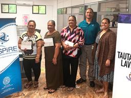 (l-r) ASCCC treasurer Christinna Lutu-Sanchez, Akenese Maifea, Faaeteete Sio, Meleseini Siufanua, ASCCC chairman Taotasi Archie Soliai, and board member Dr. Jueta McCutchan. (Not pictured is Lumana'i Maifea).