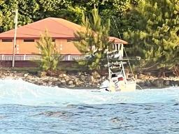 Fishing boat aground in Pago harbor