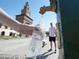 filling a plastic water bottle